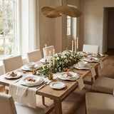 White Waves Plate Collection styled in a warm dining room