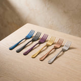 Close-up of the Barcelona Salad Fork iridescent finishes