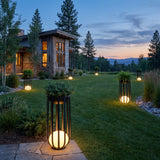 Flower Pot Lamps spread across a mountain estate lawn at dusk