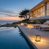 Flat Out Lights lining a poolside terrace at dusk
