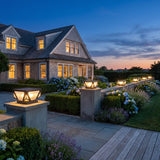 Glow Beam Outdoor Light (Solar) on masonry gate piers at dusk