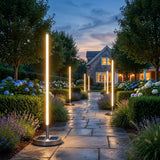 Lamps in a landscaped garden at dusk