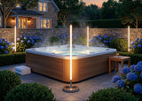 Lamp beside a hot tub at dusk