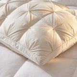 Close-up of the pinch-pleat pillow top and piped gusset border