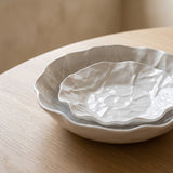 Close-up of the crushed-silk texture on the Kajabi Plate Collection