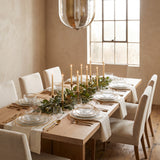 Opaque Plate Collection styled in a warm dining room