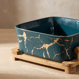 Close-up of the European Serving Bowl (Green) gold marble glaze