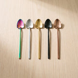Granada Coffee Spoon — jewel-toned coffee spoons on a warm wood table