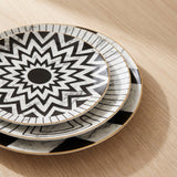 Jabr Plate Collection — black-and-white marble geometric plates with gold rims