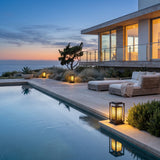 Cage Post Light (Outdoor Solar) lining a poolside terrace at dusk