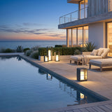 Garden Lantern (Solar) lining a poolside terrace at dusk