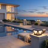 Glow Beam Outdoor Light (Solar) lining a poolside terrace at dusk