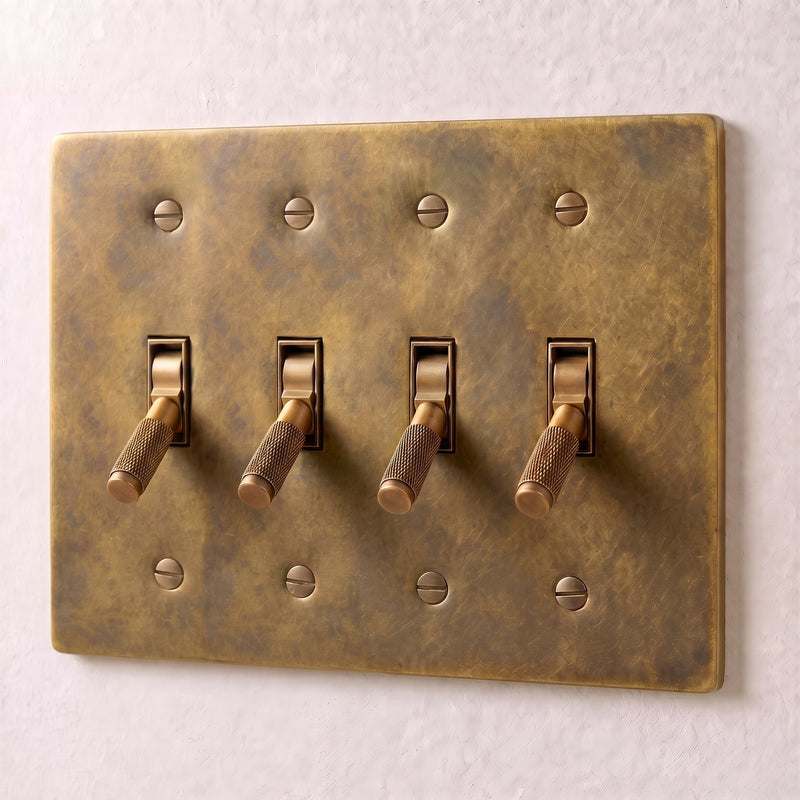 Brass Toggle Switch — 4 Gang · Vintage Brass with Patina