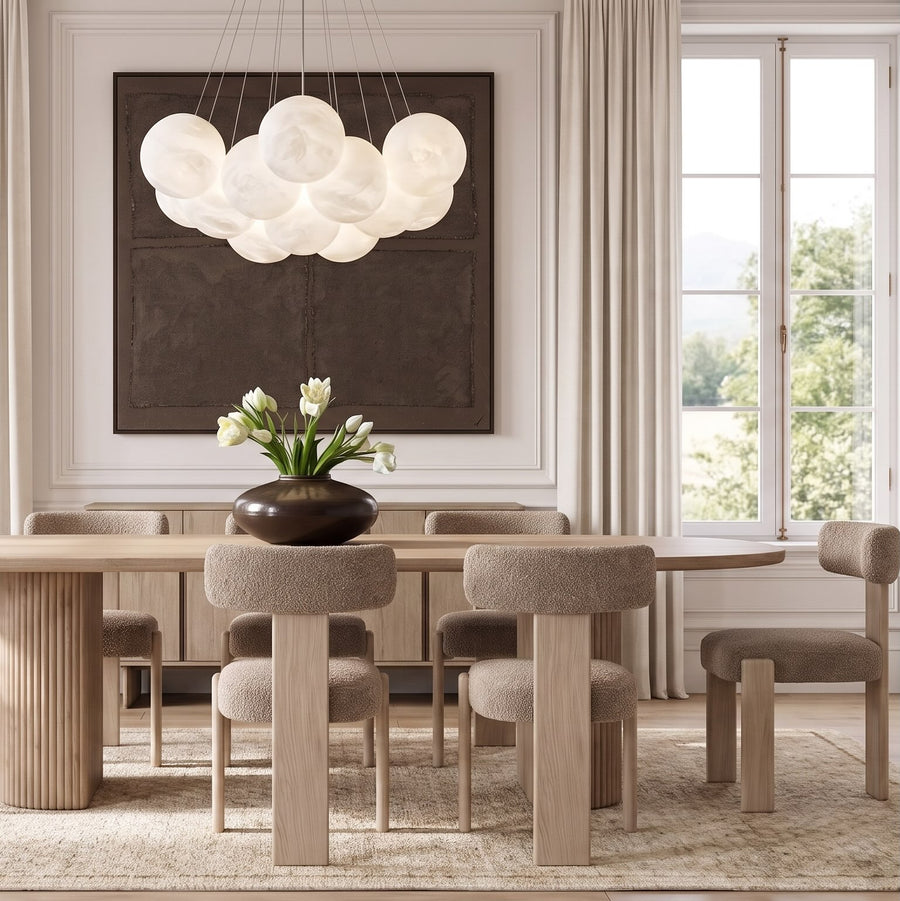 Japandi Wishbone chairs around a natural oak dining table