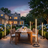 Lamps on a patio dining area at dusk