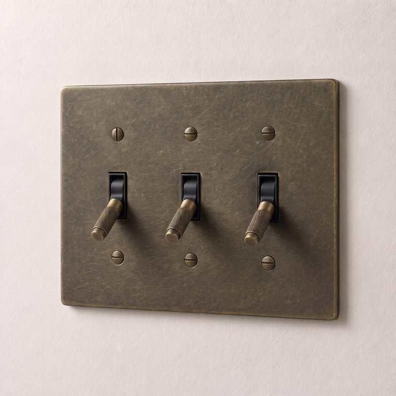 Brass 4-Way Toggle Switch — 3 Gang · Bronze with Patina