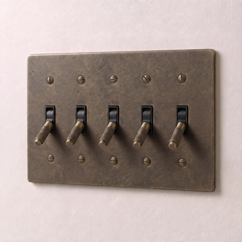 Brass Toggle Switch — 5 Gang · Bronze with Patina