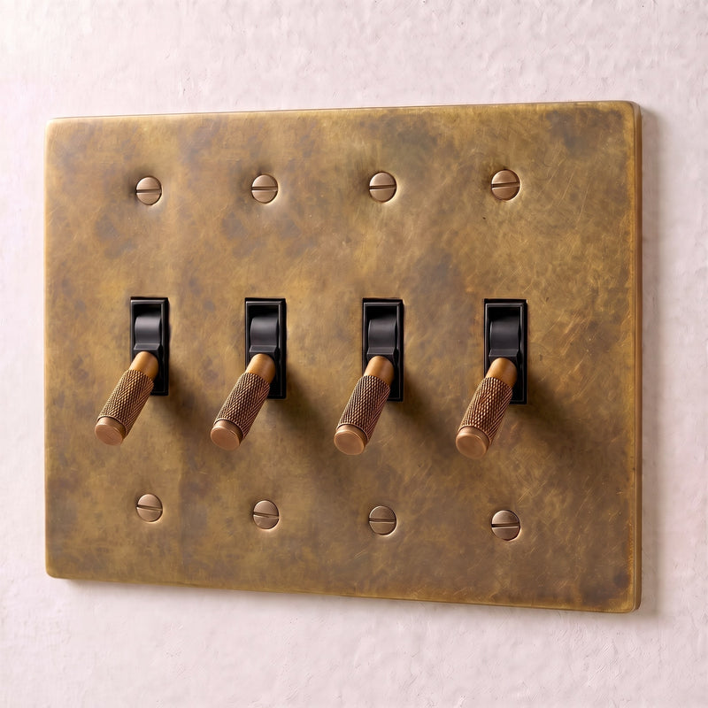 Brass Toggle Switch — 4 Gang · Vintage Brass with Patina