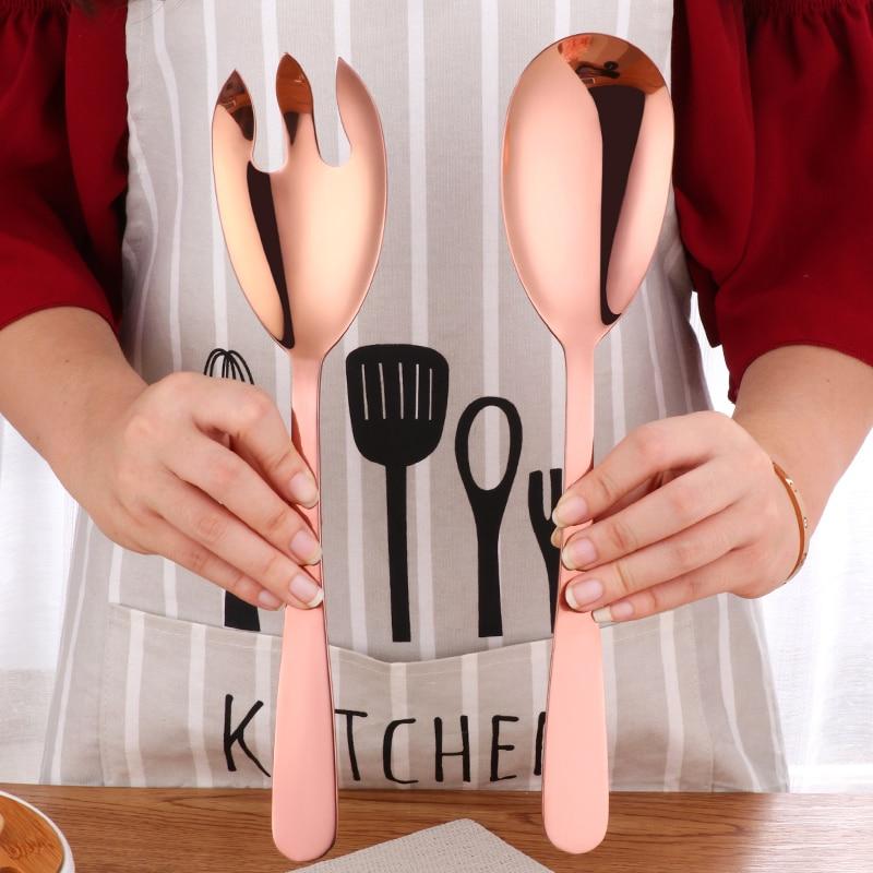 https://articture.com/cdn/shop/products/Long-Serving-Spoon-Stainless-Steel-Salad-Fork-And-Spoon-Set-Restaurant-Service-Spoon-Public-Tableware-Using_45ea8402-775f-43fe-a6d3-eaa83972fcfd_800x.jpg?v=1571711118
