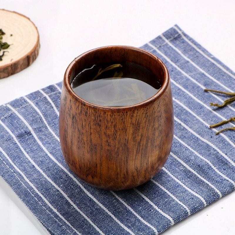 https://articture.com/cdn/shop/products/Natural-Jujube-Wooden-Cup-Tea-Cup-Wood-Primitive-Handmade-Water-Coffee-Cup-Drinking-Cup-Drinkware-Kitchen_19531435-4dd0-4f90-a5f5-4ff16d55965b_800x.jpg?v=1595272331